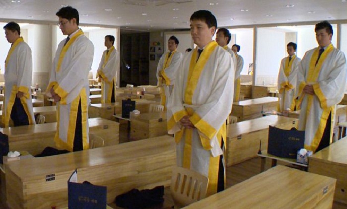 The employees shut inside coffins in Korea
